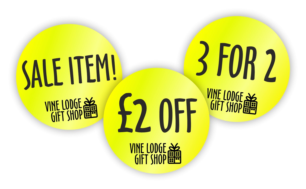 Circular fluorescent promotional labels